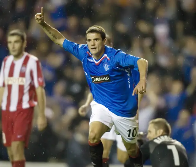 Nacho Novo celebrates his late goal at Ibrox