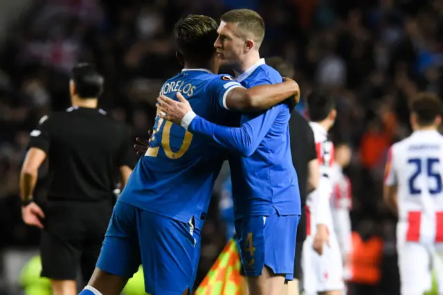 John Lundstram and Alfredo Morelos embrace at full-time