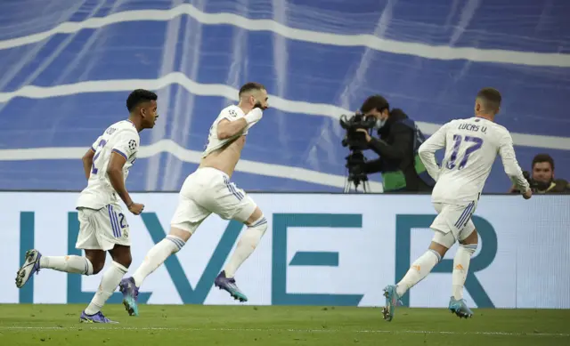 Real Madrid's Karim Benzema celebrates scoring vs PSG