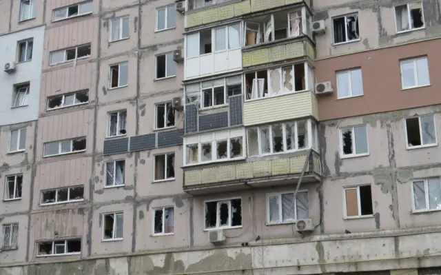 A view shows a residential building, which locals said was damaged by recent shelling, in Mariupol, Ukraine February 26, 2022.