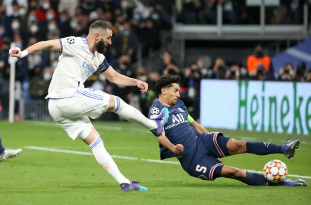 Real Madrid's Karim Benzema scores vs PSG