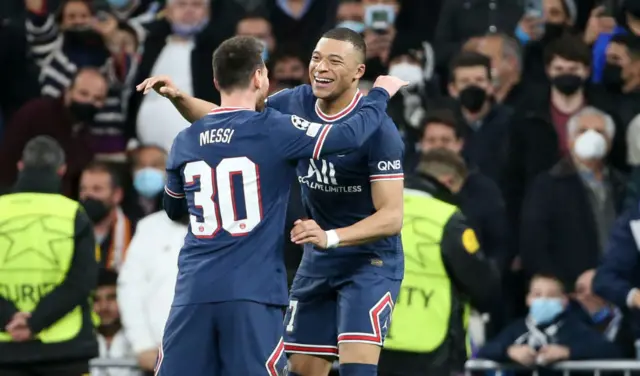 PSG's Kylian Mbappe and Lionel Messi celebrate