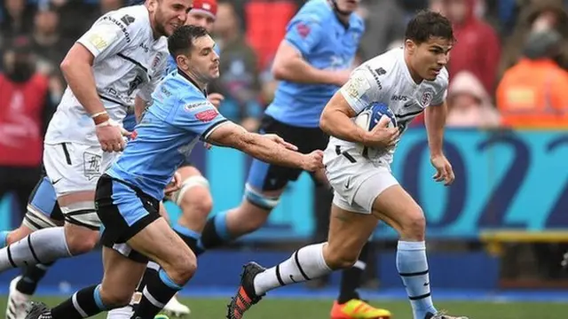 Cardiff's Tomos Williams chases Antoine Dupont during the Heineken Champions Cup match against Toulouse in December 2021