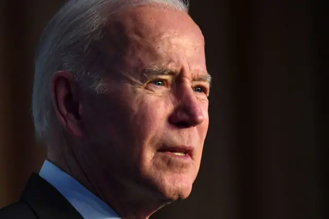 US President Joe Biden speaks at the Democratic National Committee Winter Meeting in Washington, DC.