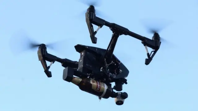 The drone with a beer bottle