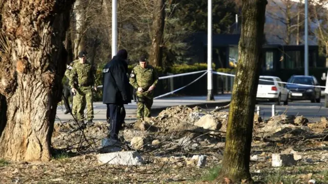 Croatian soldiers investigate the site where a military drone crashed in Zagreb, Croatia