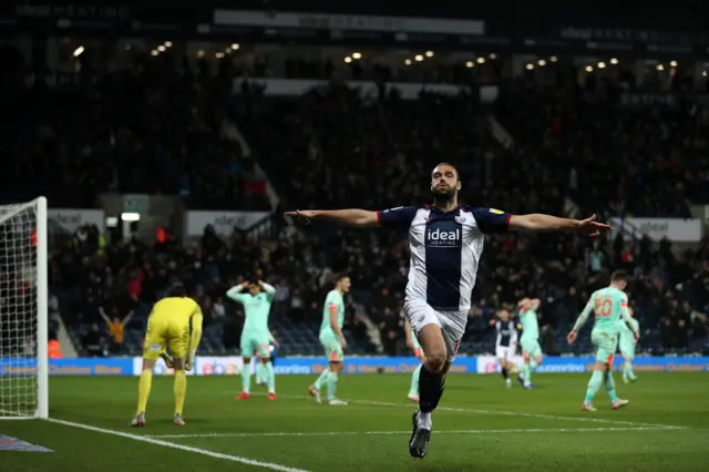 Andy Carroll celebrates his equaliser