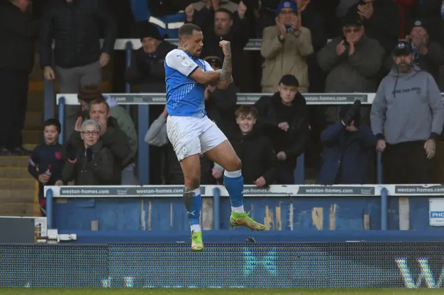 Jonson Clarke-Harris celebrates his equaliser