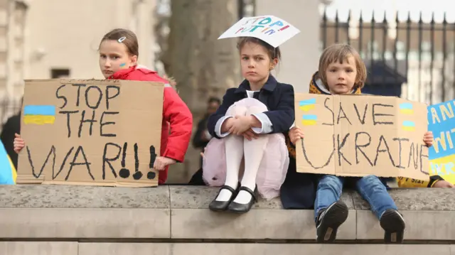 (left to right) Maia aged 8, Kira aged 8 and Alexander aged 5 at a demonstration organised by London EuroMaidan