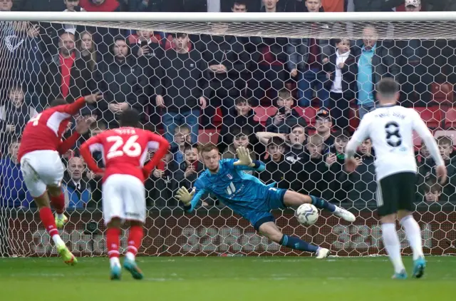 Carlton Morris scores his penalty against Fulham