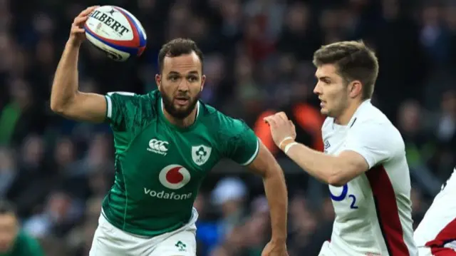 Jamison Gibson-Park is chased by England's Harry Randall