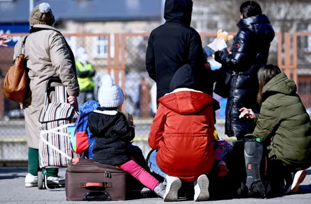 Refugees from Ukraine arrive at the train station in Przemysl, south-eastern Poland