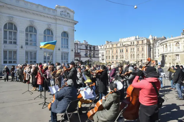 The symphony orchestra and choir of the Odessa National Academic Opera and Ballet Theater perform the National Anthem of Ukraine and a number of famous musical work