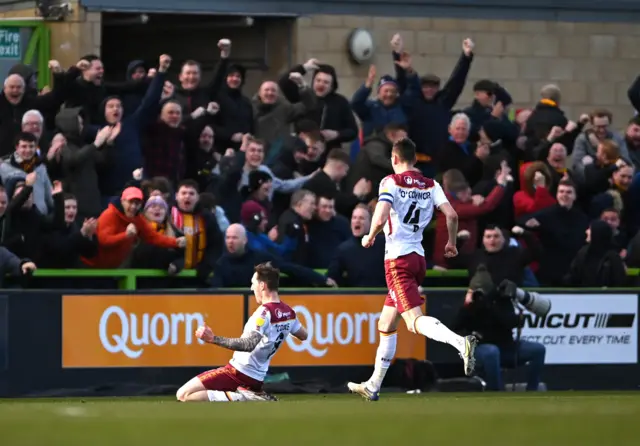 Callum Cooke celebrates his goal for Bradford at Forest Green