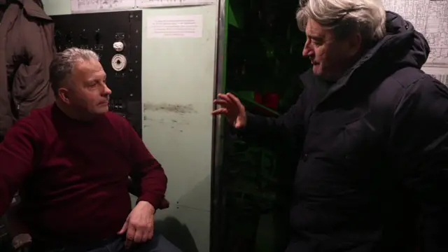 Train driver Boris Lysenko pictured talking with BBC correspondent Fergal Keane