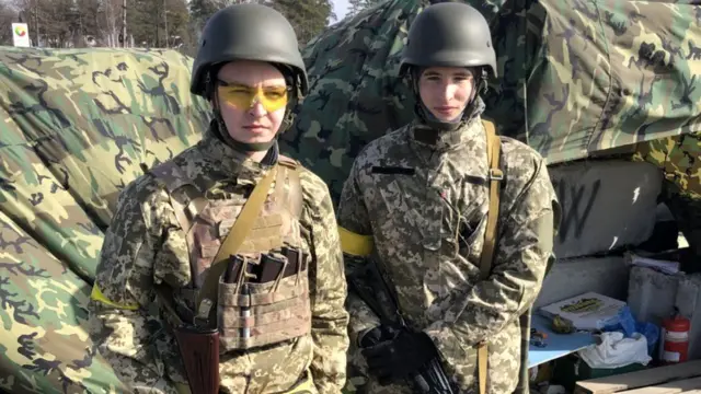 Maksym Lutsyk,19 (left) and Dmytro Kisilenko, 18, are now only about a mile behind the frontline