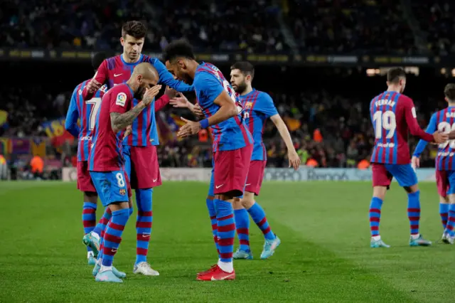 Pierre-Emerick Aubameyang and Dani Alves celebrate