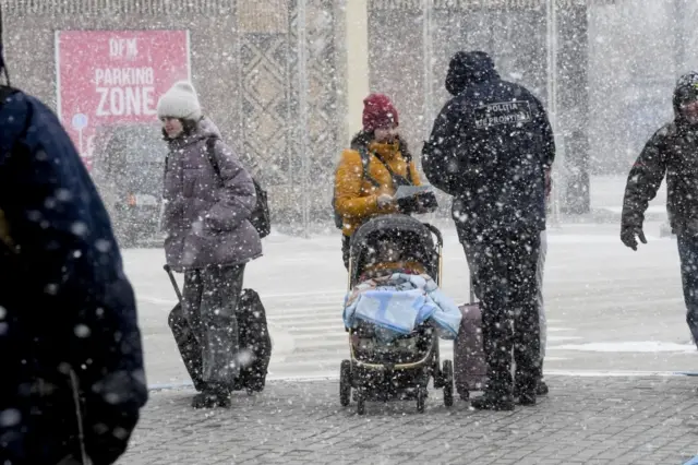 refugees in the snow