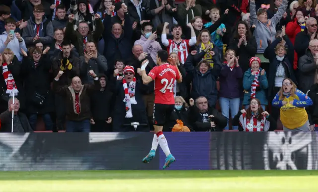 Southampton's Mohamed Elyounoussi celebrates in front of the fans after scoring