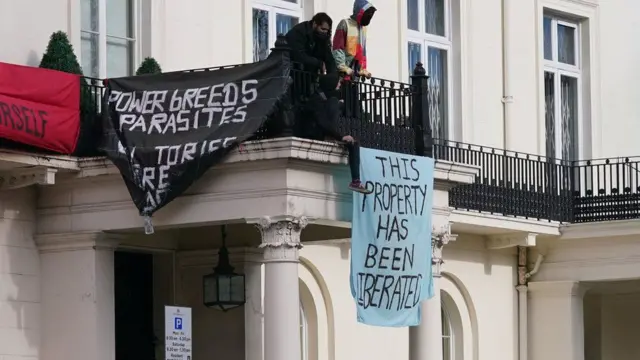 Squatters on the balcony of a mansion belonging to Russian oligarch Oleg Deripaska in central London