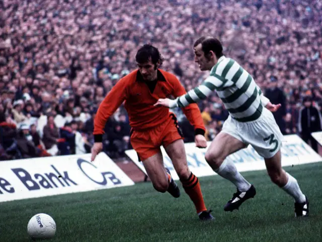 Celtic's Jim Brogan (right) and Dundee Utd's Archie Knox chase after the ball