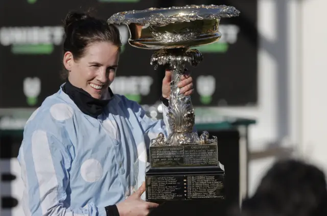 Rachael Blackmore lifts the winners' trophy for the 2021 Champion Hurdle at Cheltenham