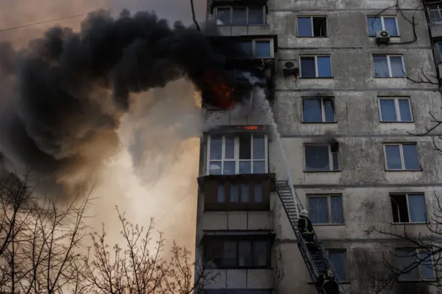 Firefighters put out a blaze in Kyiv on Tuesday