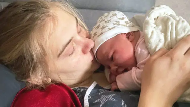 Anna and her new-born daughter Alisa