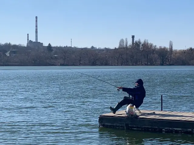 A man fishing in Uman