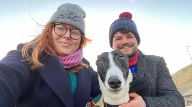 Hazel Kirwin with her husband Joe and greyhound Connie