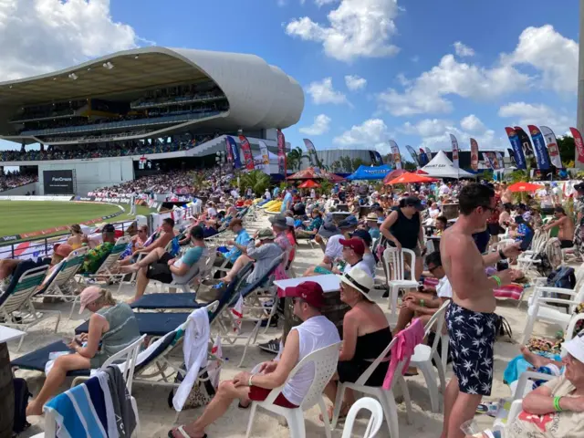 Fans in the party stand in Barbados