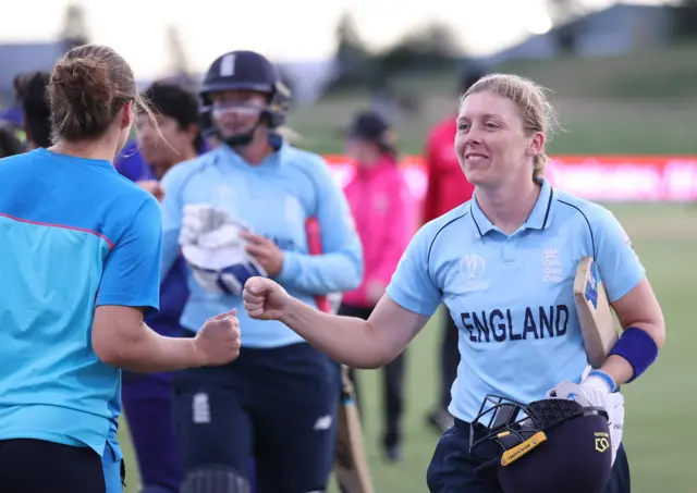 Heather Knight walks off after leading England to win over India at Women's Cricket World Cup