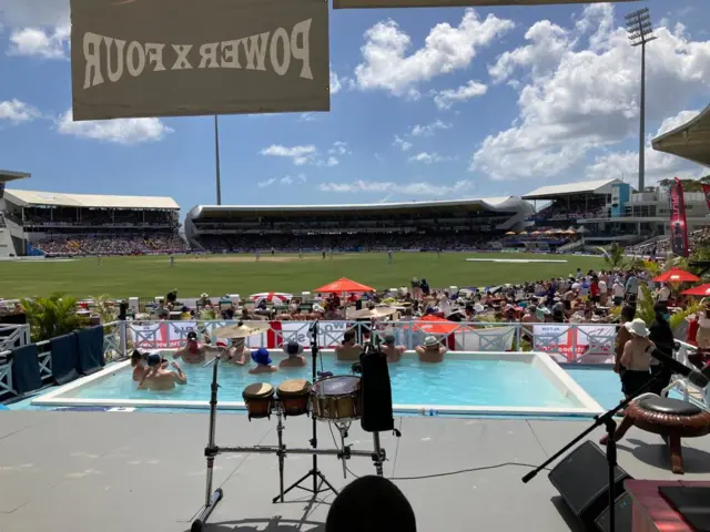 Fans in the pool in the stadium in Barbados