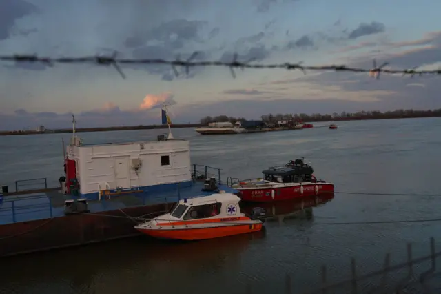 A barge carrying Ukrainian refugees approaches the border crossing in Isaccea, Romania on 8 March