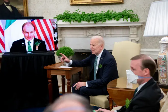 US President Joe Biden speaks during a virtual meeting with Taoiseach Micheál Martin in the Oval Office of the White House in Washington, DC, 17 March 2021