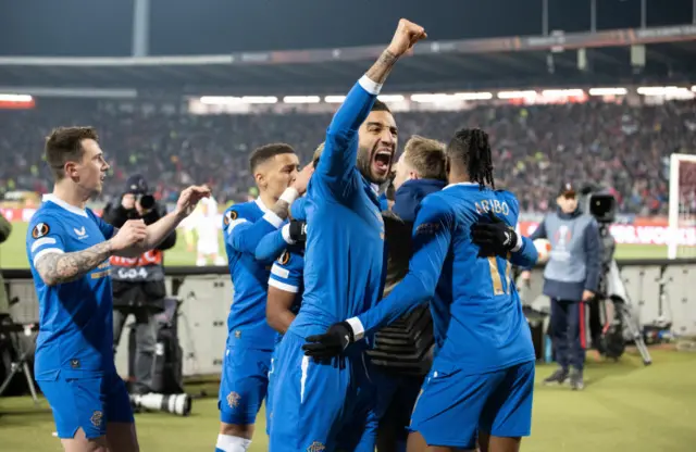 Rangers players celebrate Ryan Kent's second-half goal in Belgrade