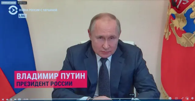 Vladimir Putin speaking on state TV