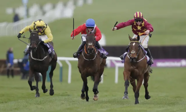 Minella Indo, A Plus Tard & Al Boum Photo compete in the closing stages of the 2021 Cheltenham Gold Cup