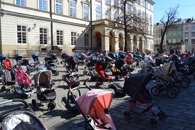 Strollers in Lviv symbolising children killed in the war