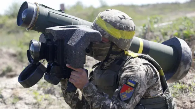 A Ukrainian soldier holding a Javelin anti-tank missile system