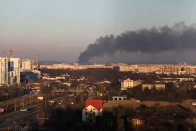 A plume of smoke visible over Lviv on Friday morning