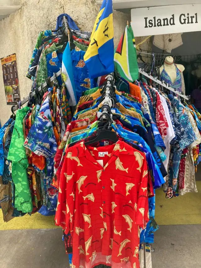 Colourful shirts on a stand in the stadium in Barbados