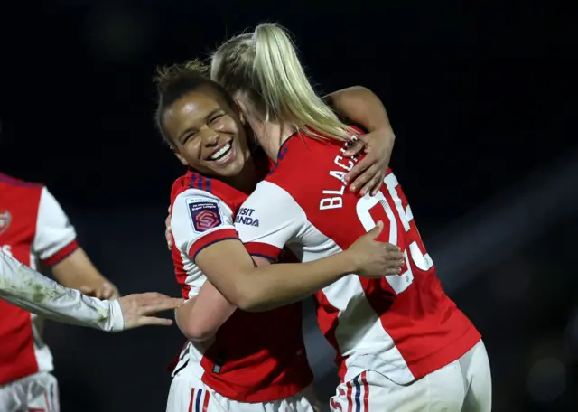 Stina Blackstenius of Arsenal celebrates after scoring their side's first goal with Nikita Parris.