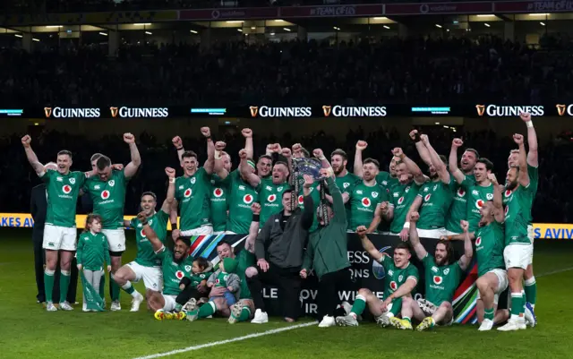 Ireland players celebrate the triple crown
