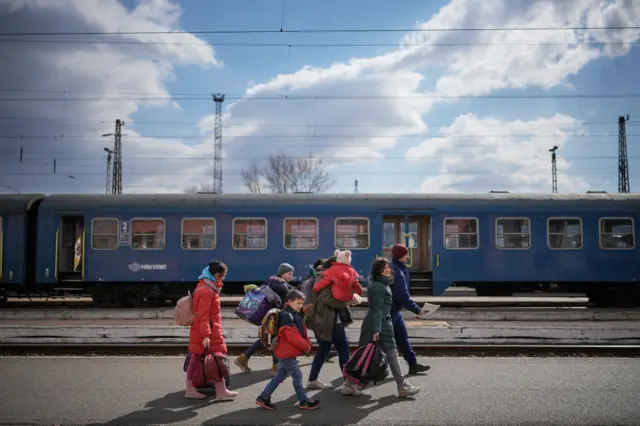 Refugees fleeing Ukraine arrive at the border train station of Zahony on March 10, 2022 in Zahony, Hungary