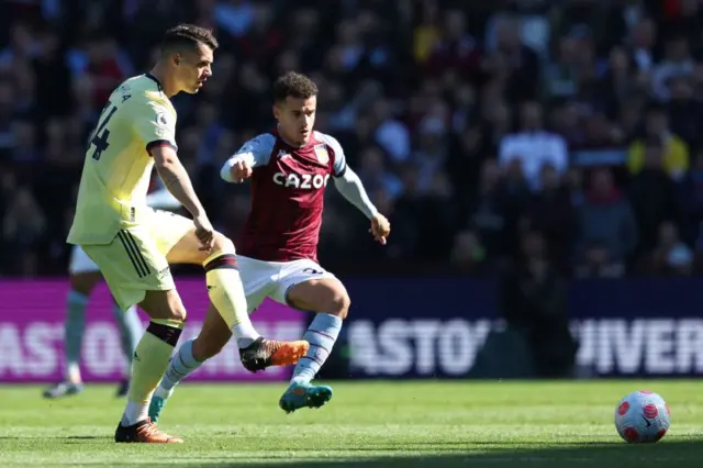 Philippe Coutinho fouls Granit Xhaka