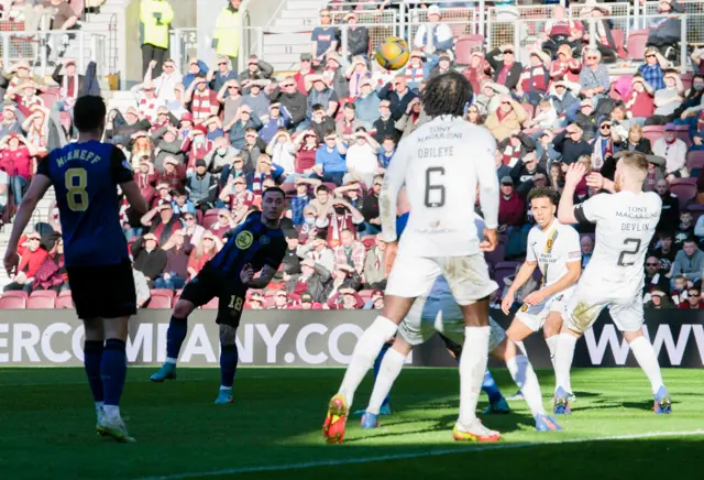 Barrie McKay (second left) watches as his shot rockets into the top corner