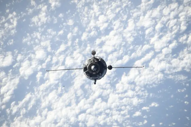 The Soyuz MS-21 spacecraft docking to the International Space Station