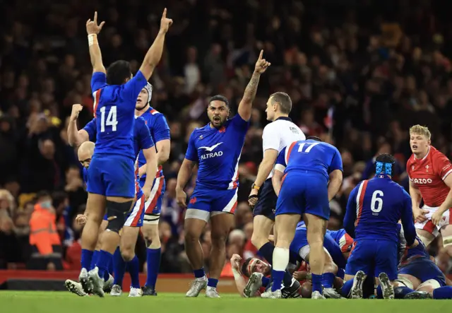 France celebrate their win in Wales