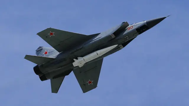 Mikoyan MiG-31K fighter jets with Kinzhal hypersonic missiles fly over Moscow's Red Square during the Victory Day military parade marking the 73rd anniversary of the victory over Nazi Germany